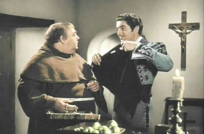 Don Diego reveals that he is Zorro to Fray Felipe by pulling out Zorro's mask.