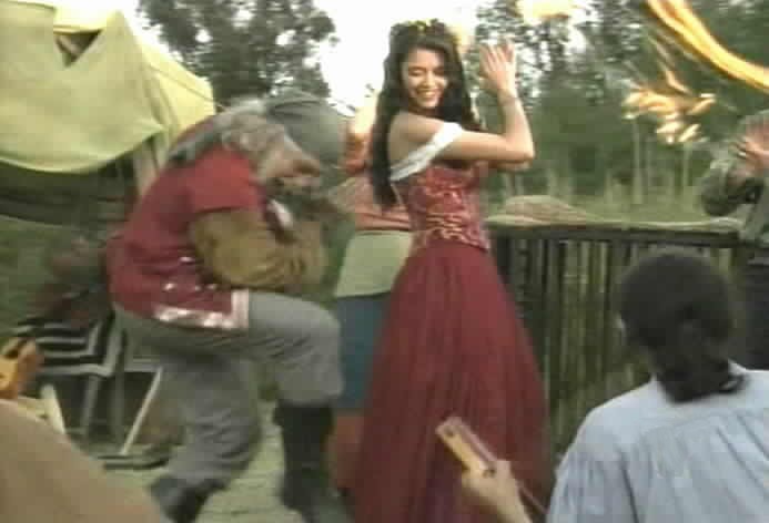 Esmeralda dances with the gypsies.