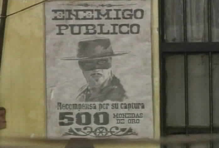 Mariangel looks at Zorro's reward poster.