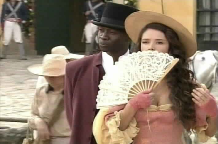 Kamba escorts Esmeralda around the city.
