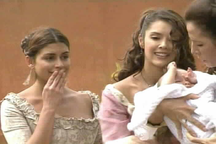Almudena and Maria Pia admire the baby.