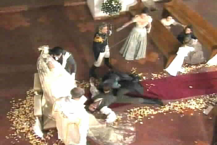 Fernando collapses after he is shot.