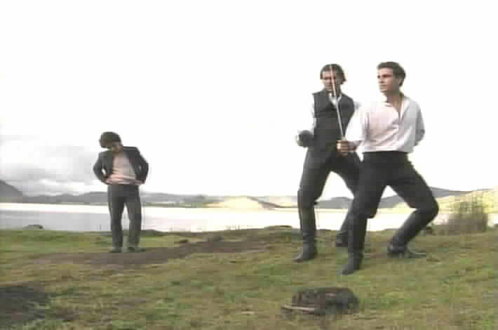 Diego teaches his son to fence.