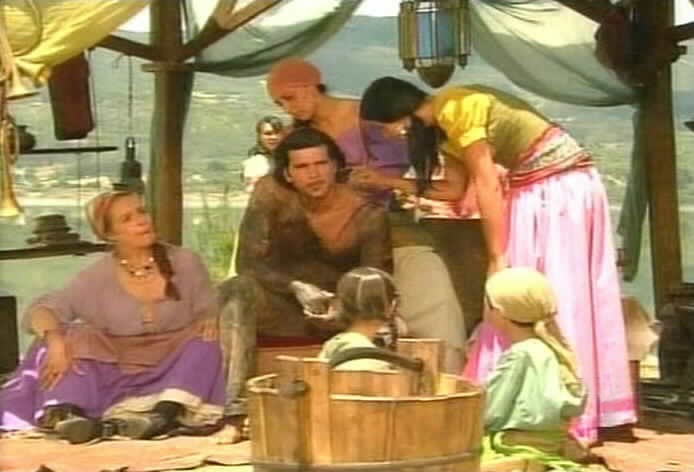 The gypsies help Diego get cleaned up.