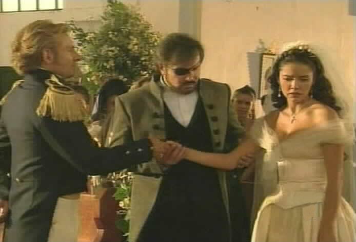 Fernando escorts Esmeralda to the altar.