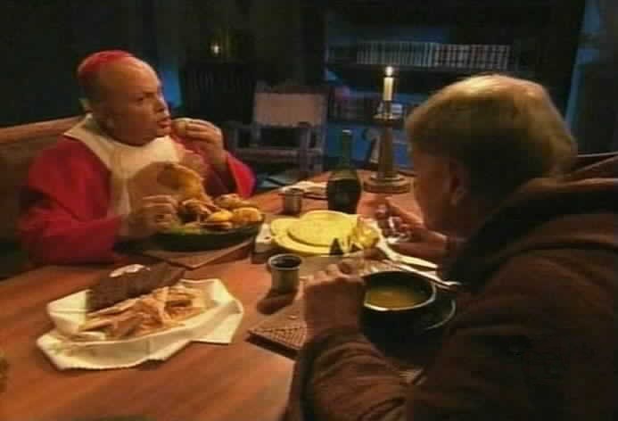 Cardinal Olivieri gorges himself while he and Padre Tomas discuss Maria Pia.