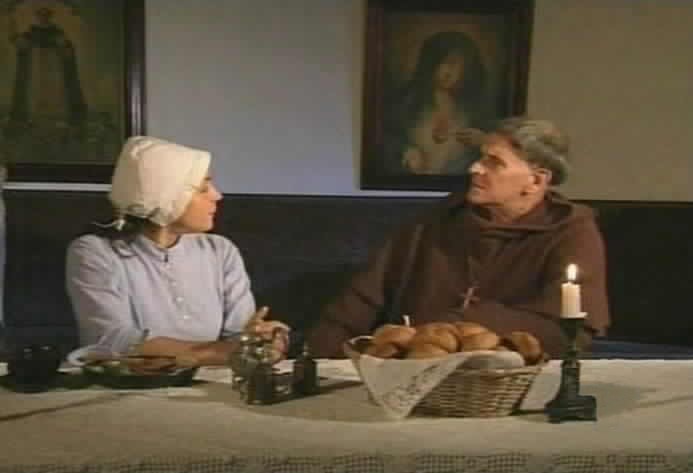 Padre Tomas and Maria Pia discuss Suplicios.