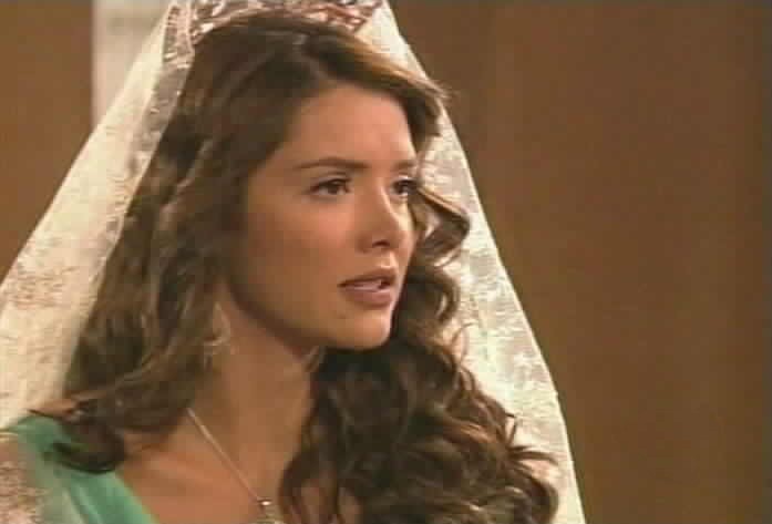Esmeralda tells Padre Tomas that she is pregnant.