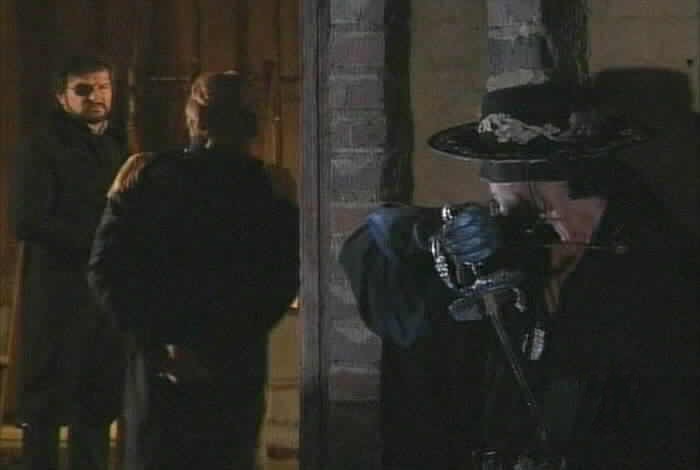 Zorro listens to Fernando and Montero.