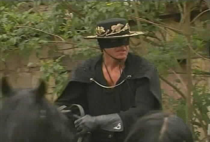 Zorro rallies a group of supporters.