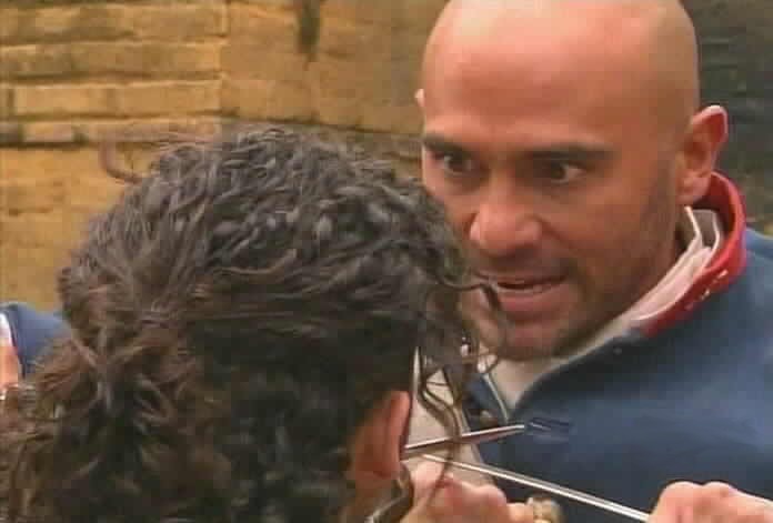 Pizarro and Renzo lock swords.