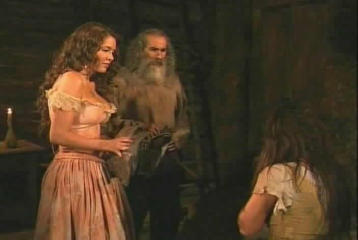 Esmeralda and Hermes gaze at Sara Kali's face.