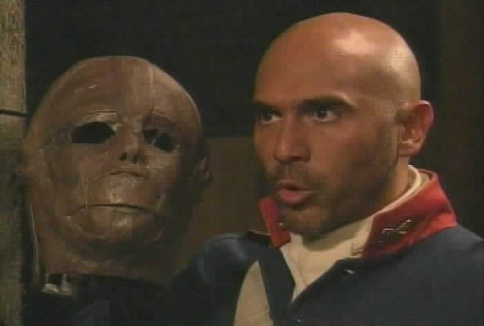 Pizarro announces that Esmeralda will now wear the iron mask.