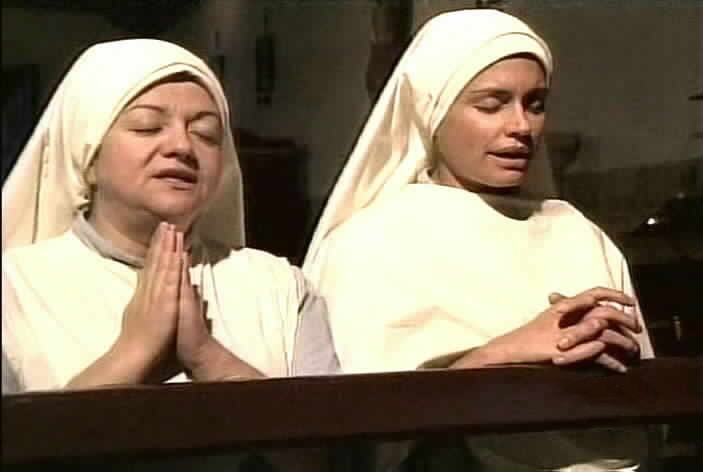Carola and Maria Pia pray.