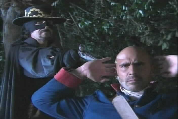 Tobias threatens Pizarro as he pretends to be Zorro.