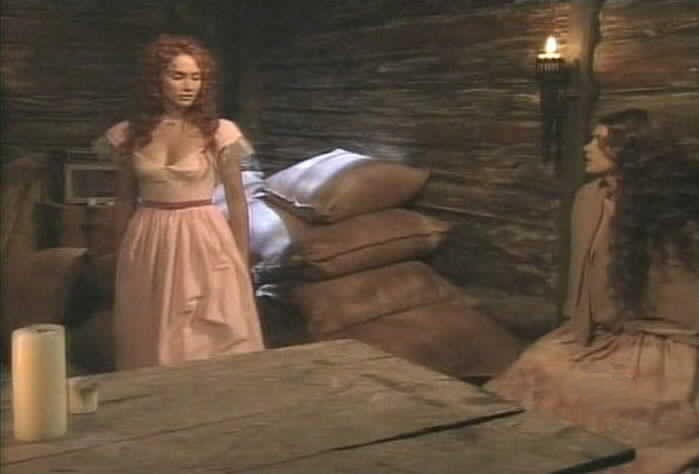 Mariangel enters the basement to speak to Esmeralda.