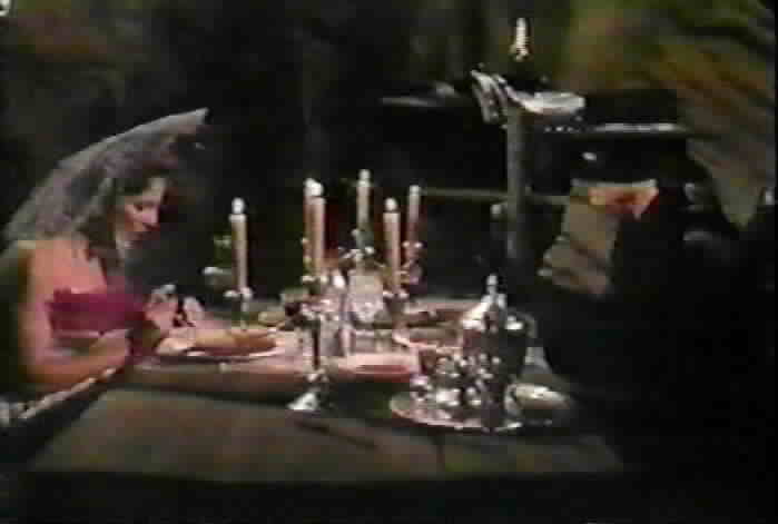 Zorro and Angelica have dinner in Zorro's cave.