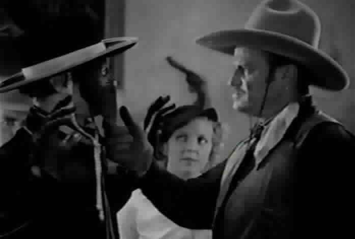 El Lobo begins to remove Zorro's mask.