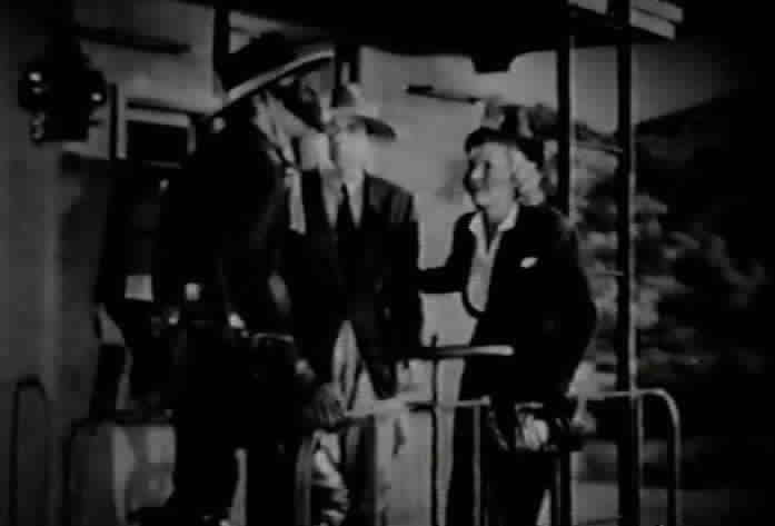 El Lobo's men prepare to bomb the train.