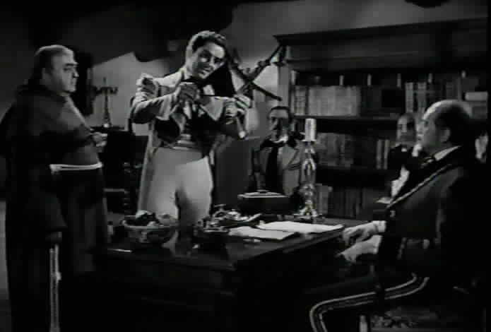 Don Diego performs a slight of hand trick for his father and guests.