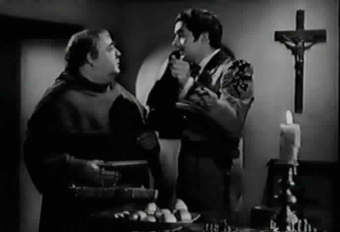 Don Diego reveals that he is Zorro to Fray Felipe by pulling out Zorro's mask.